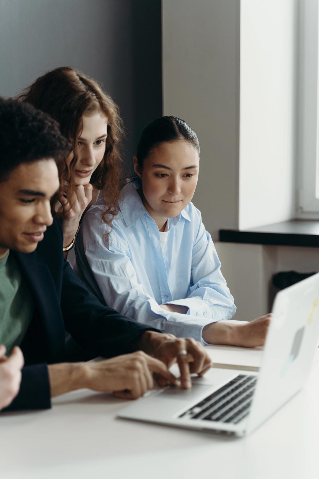 Team working on a laptop